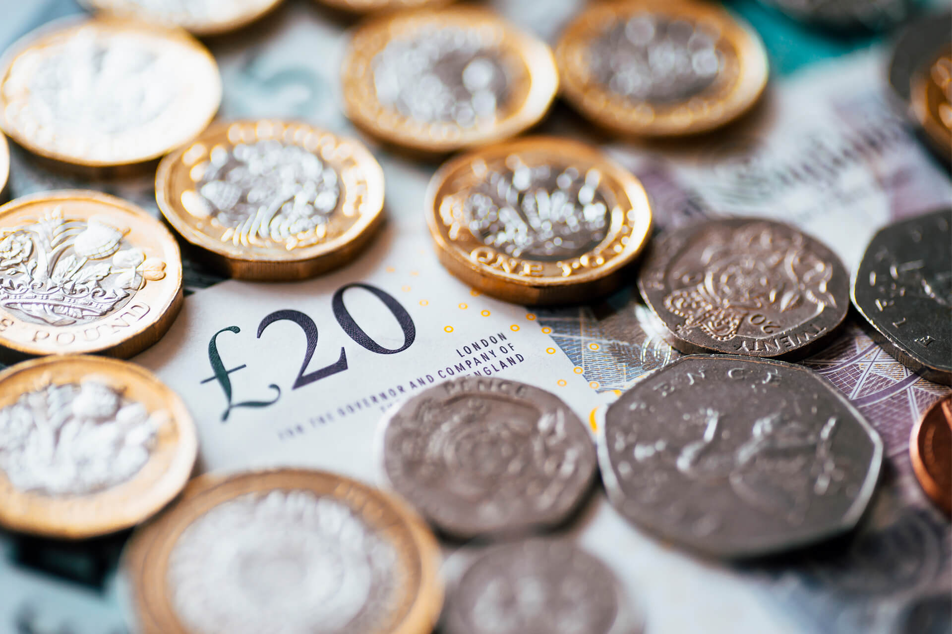 Spending - pound coins and change