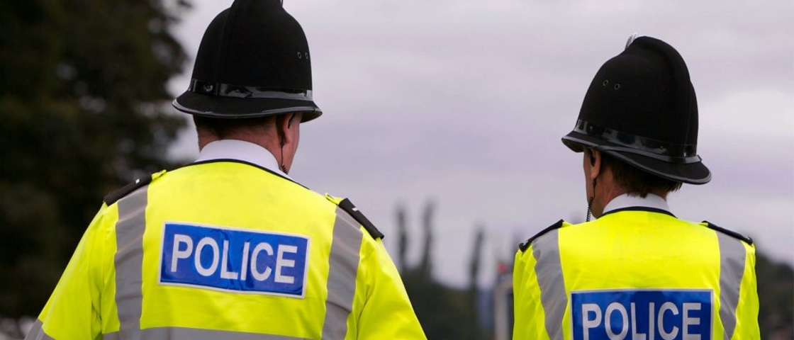 The back of two police officers