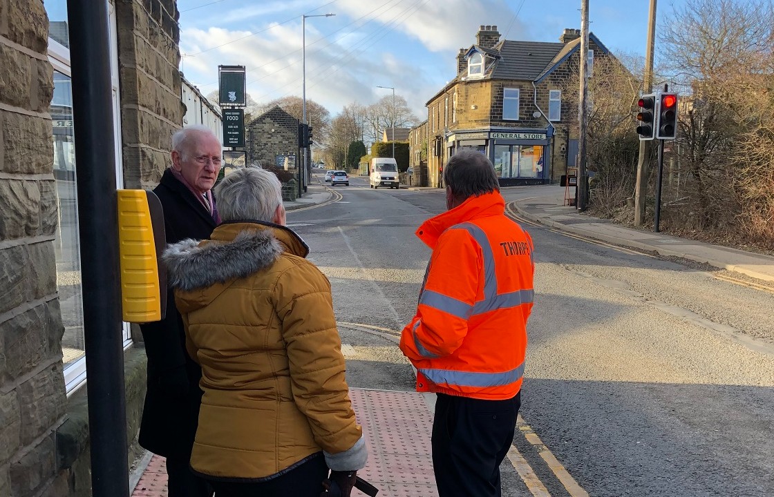 Dr Alan Billings and residents at a junction in Thurgoland, South Yorkshire