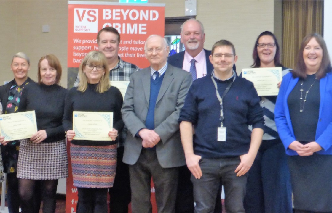 Dr Alan Billings pictured with graduates of a Independent Victim Advocate (IVA) accredited course.