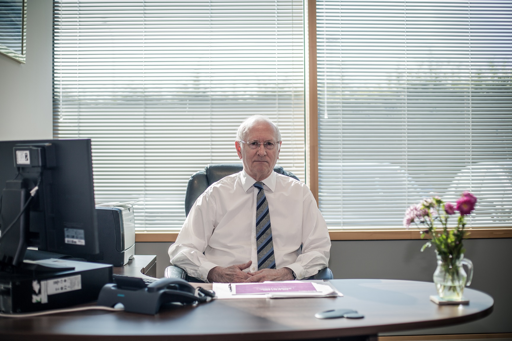 Dr Alan Billings, South Yorkshire Police and Crime Commissioner sat at a desk